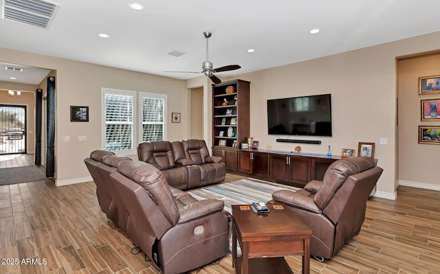 living room featuring ceiling fan