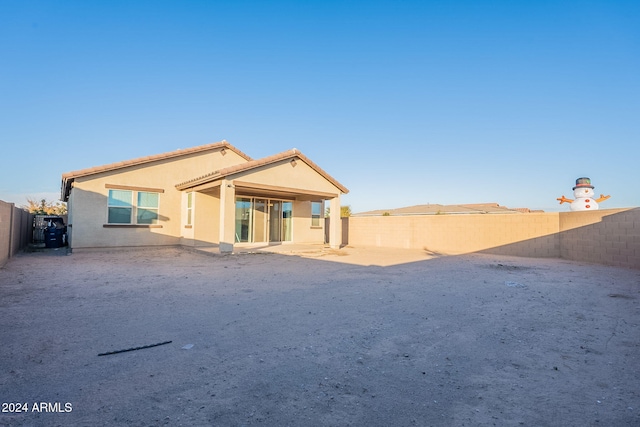 back of house featuring a patio area