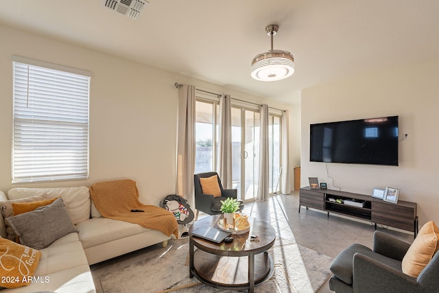 living room with light tile patterned floors