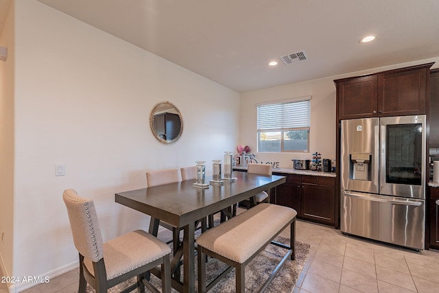 dining room with light tile patterned floors