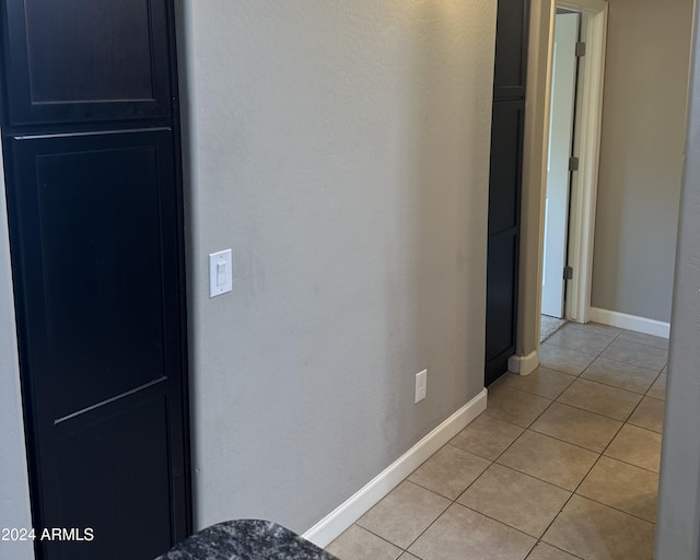 2150 W Alameda Rd Unit 2139, Phoenix, AZ 85085 - hallway featuring light tile patterned flooring and baseboards