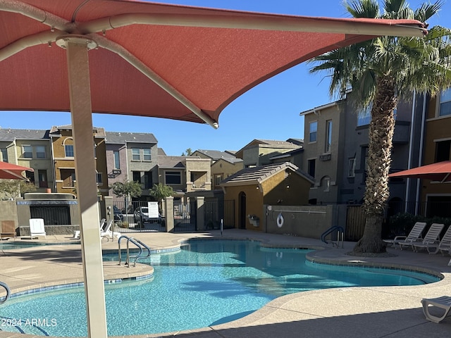 2150 W Alameda Rd Unit 2139, Phoenix, AZ 85085 - community pool featuring a residential view, a patio area, and a ceiling fan