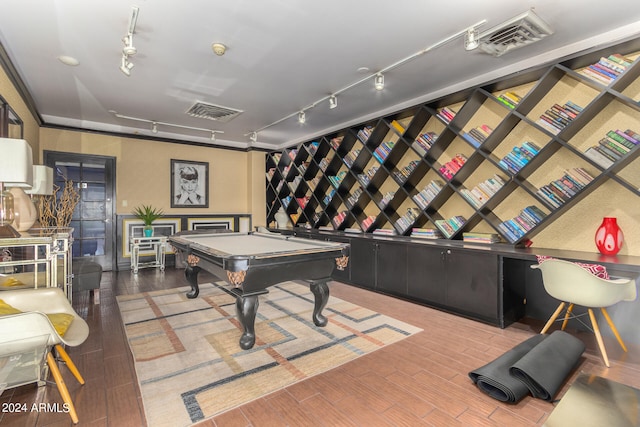 playroom featuring hardwood / wood-style floors, rail lighting, and pool table