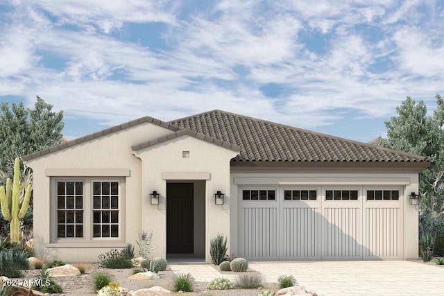 mediterranean / spanish-style home featuring a garage