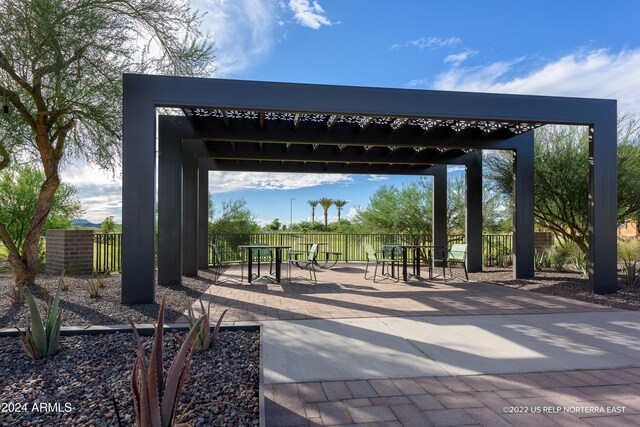 surrounding community featuring a patio area