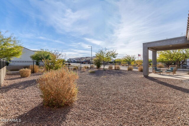 view of yard with a patio area and fence