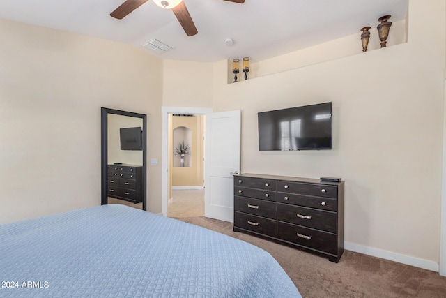 carpeted bedroom featuring ceiling fan