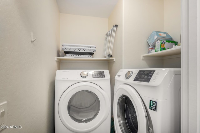 washroom featuring separate washer and dryer