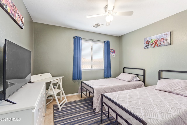 carpeted bedroom with ceiling fan