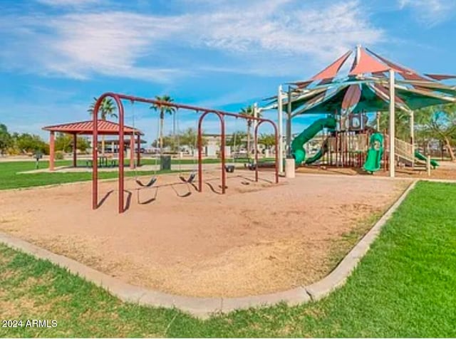 view of jungle gym featuring a yard