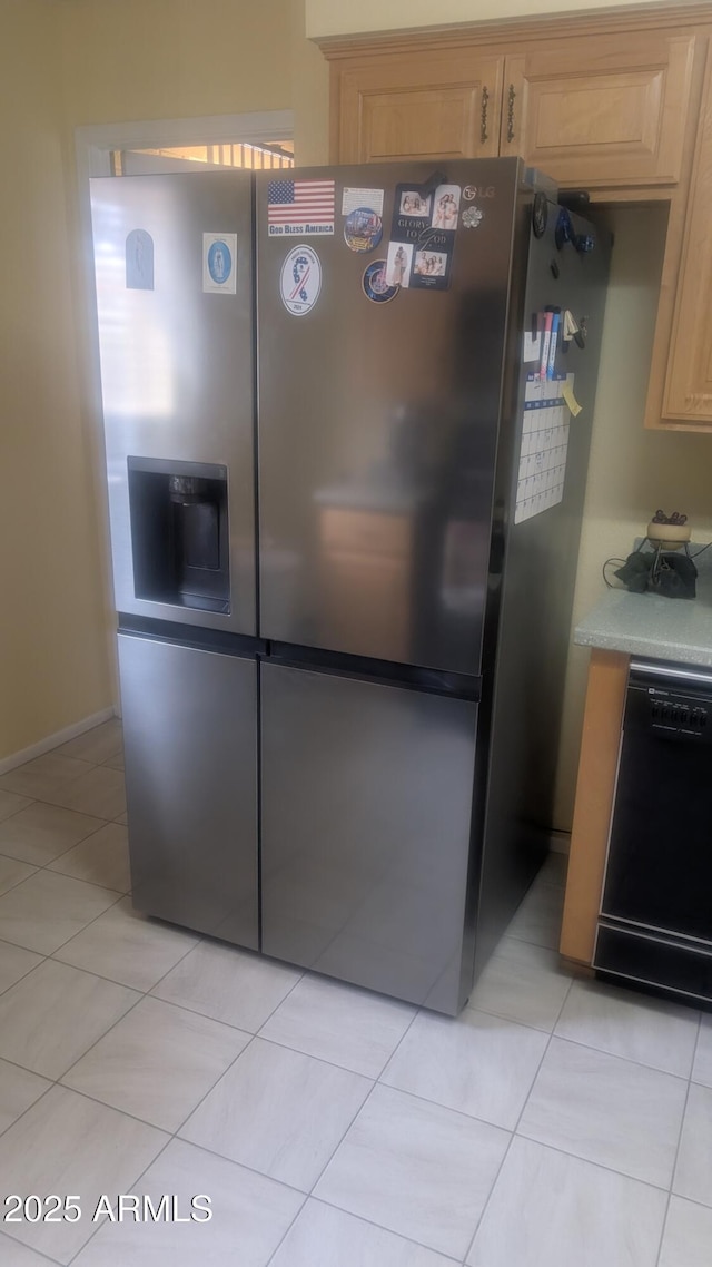 962 S Main Dr, Apache Junction, AZ 85120 - detailed view of black dishwasher, freestanding refrigerator, and light countertops