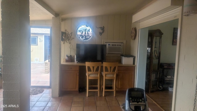 962 S Main Dr, Apache Junction, AZ 85120 - dining room featuring healthy amount of natural light, an AC wall unit, and light tile patterned floors