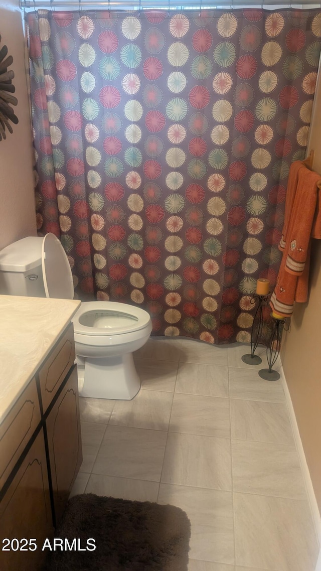 962 S Main Dr, Apache Junction, AZ 85120 - bathroom featuring toilet, vanity, tile patterned flooring, and a shower with curtain