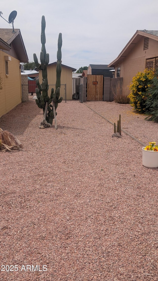 962 S Main Dr, Apache Junction, AZ 85120 - view of yard with a gate and fence