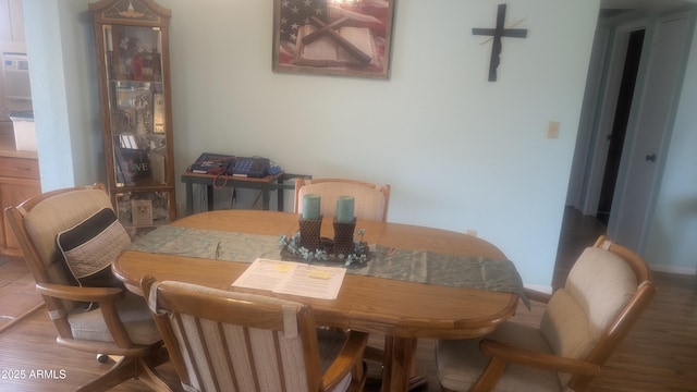 962 S Main Dr, Apache Junction, AZ 85120 - dining space featuring wood finished floors and baseboards
