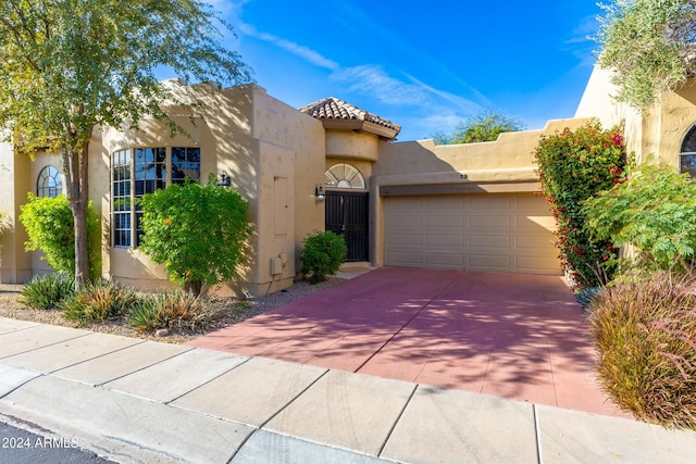 view of front of home featuring a garage