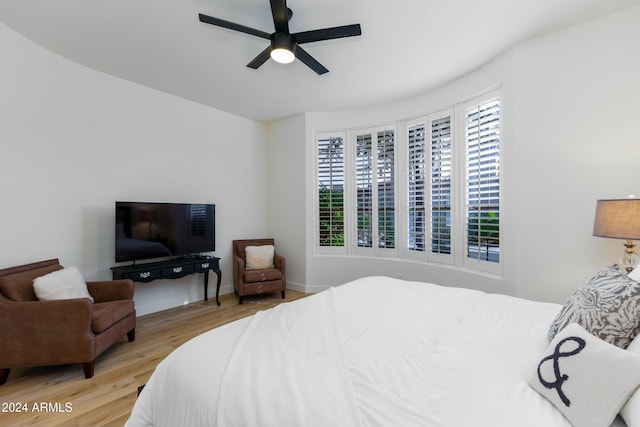 bedroom featuring ceiling fan and light wood-type flooring