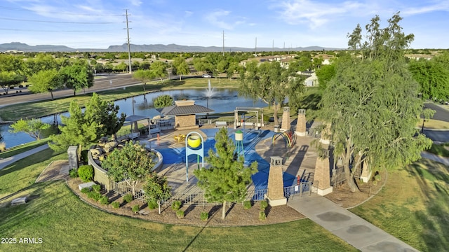 bird's eye view featuring a water and mountain view