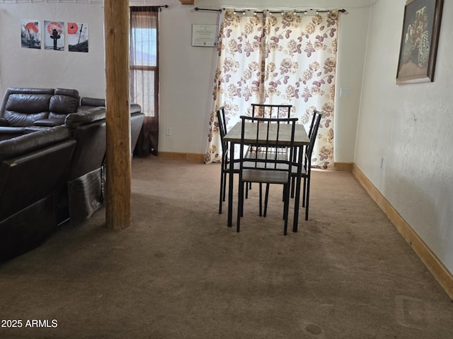 4207 N Santa Fe Ave, Douglas, AZ 85607 - carpeted dining space with baseboards