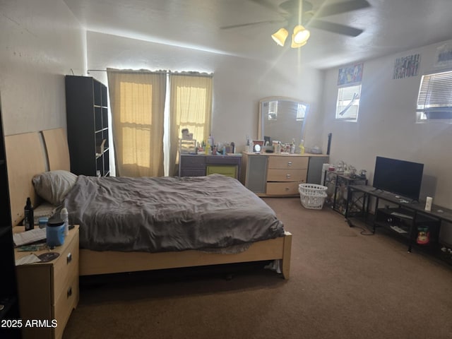 4207 N Santa Fe Ave, Douglas, AZ 85607 - carpeted bedroom featuring a ceiling fan