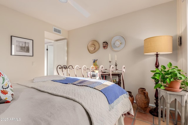 bedroom featuring light tile patterned floors and ceiling fan