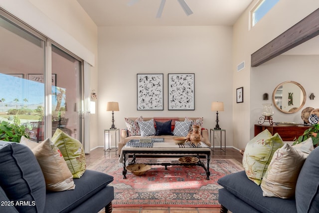 living room featuring ceiling fan