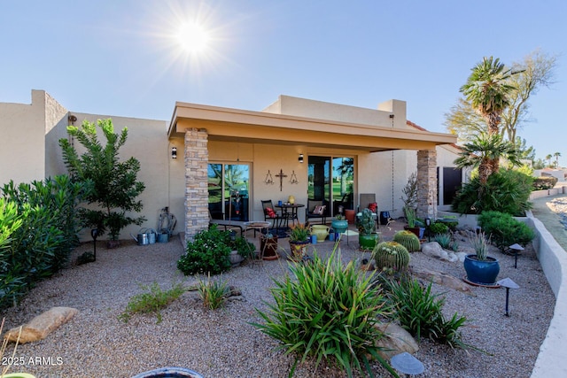 rear view of house featuring a patio area