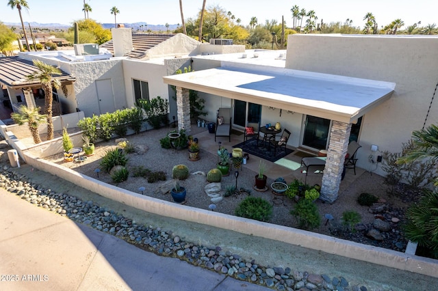 contemporary home featuring a patio area