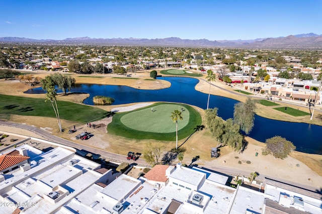 bird's eye view with a water and mountain view