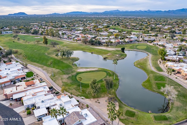 bird's eye view with a water and mountain view