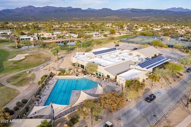 birds eye view of property featuring a water and mountain view