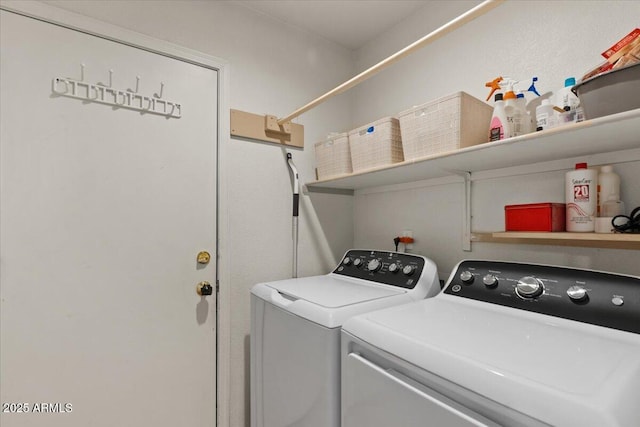 laundry room with laundry area and washing machine and dryer