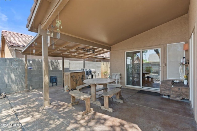 view of patio / terrace featuring outdoor dining area and a fenced backyard