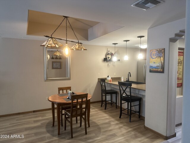 unfurnished living room with ceiling fan and wood-type flooring