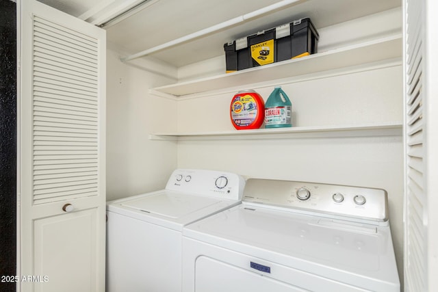 laundry room with washer and clothes dryer