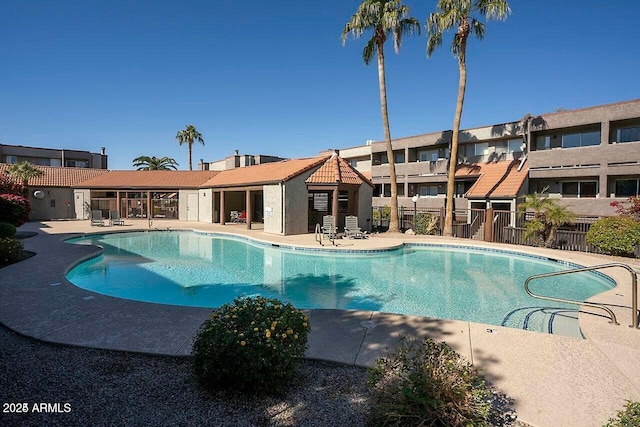 view of pool featuring a patio