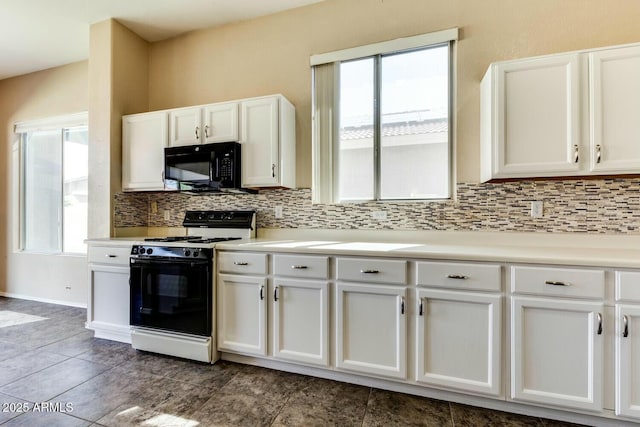 11664 W Eagle Ct, Surprise, AZ 85378 - kitchen with light countertops, black microwave, gas range, decorative backsplash, and white cabinetry