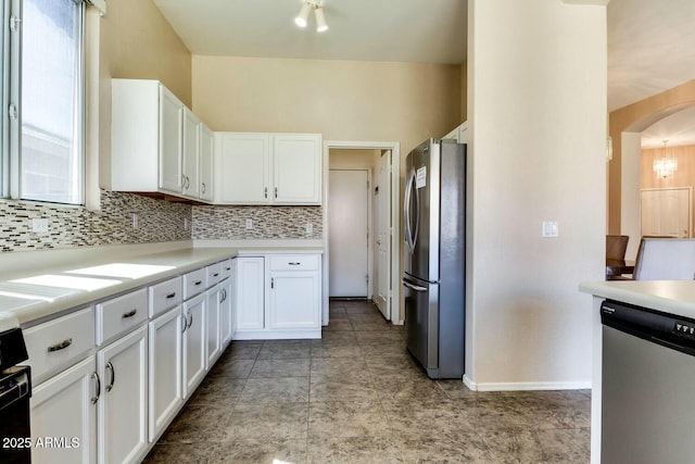 11664 W Eagle Ct, Surprise, AZ 85378 - kitchen with white cabinets, stainless steel appliances, light countertops, and backsplash