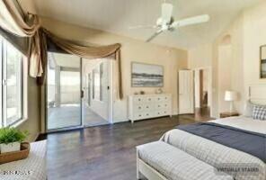 11664 W Eagle Ct, Surprise, AZ 85378 - bedroom with ceiling fan, access to outside, and wood finished floors