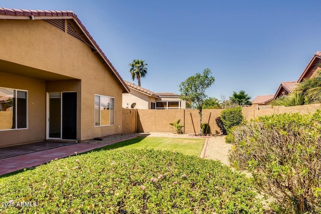 11664 W Eagle Ct, Surprise, AZ 85378 - view of yard featuring a fenced backyard and a patio