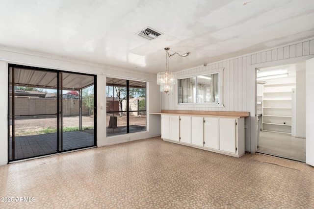 2002 W Whitton Ave, Phoenix, AZ 85015 - unfurnished living room with a chandelier
