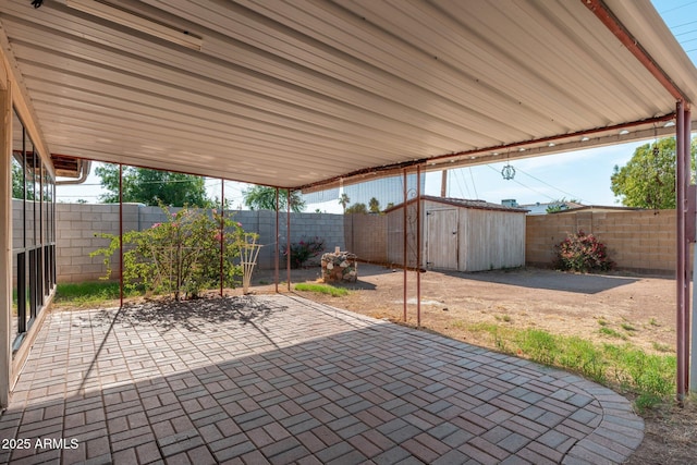 2002 W Whitton Ave, Phoenix, AZ 85015 - fenced backyard featuring a patio, a storage shed, and a carport