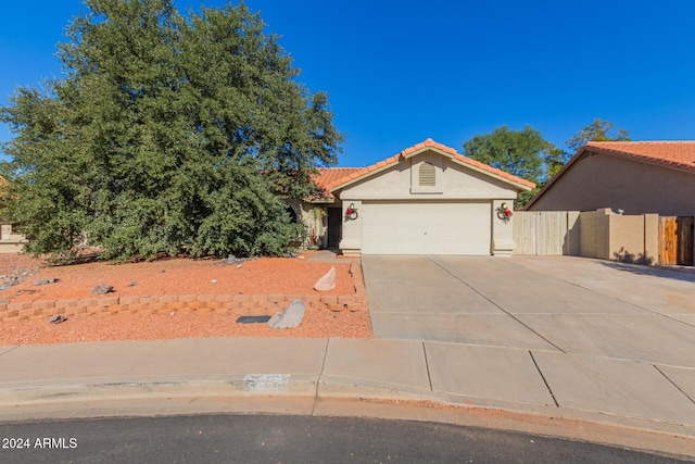 view of front of property featuring a garage