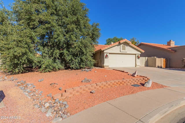 view of front of home with a garage