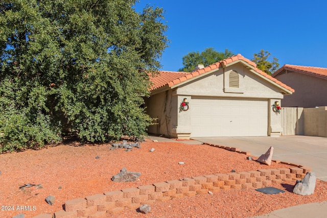 view of front of property featuring a garage