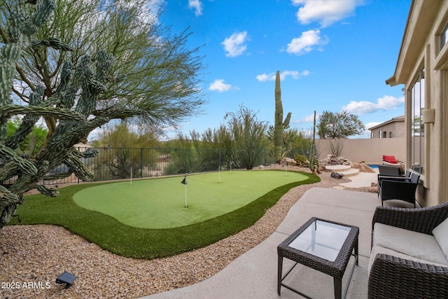 exterior space featuring a patio area and a fenced backyard