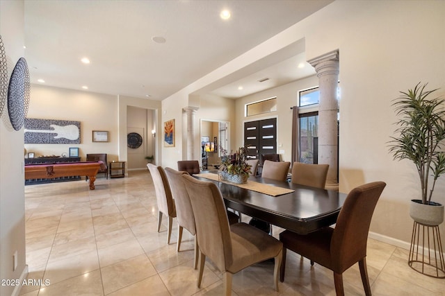 dining room featuring recessed lighting, visible vents, and decorative columns