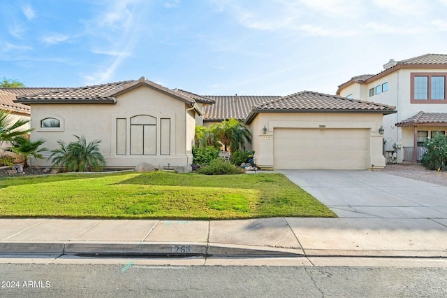 755 E Orchid Ln, Gilbert, AZ 85296 - mediterranean / spanish-style home with a garage and a front yard