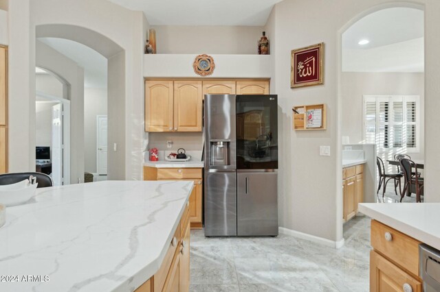 755 E Orchid Ln, Gilbert, AZ 85296 - kitchen featuring light brown cabinets and stainless steel appliances