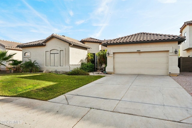 755 E Orchid Ln, Gilbert, AZ 85296 - mediterranean / spanish-style home featuring a front yard and a garage